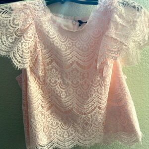 brand new gorgeous lace blouse, fits like a medium. Almost cropped style